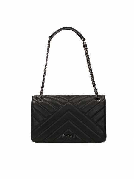 Bolso negro ornamentado colgado de una cadena TERN M