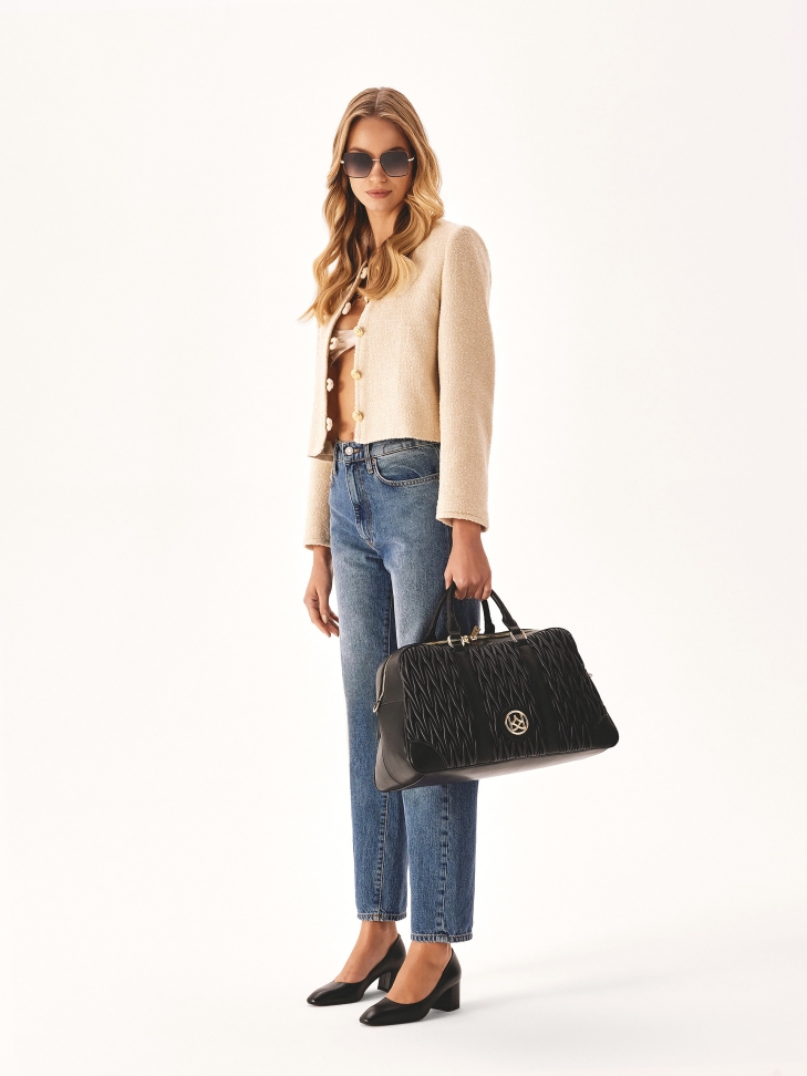 Bolsa de viaje de suave piel acolchada negra TRIP