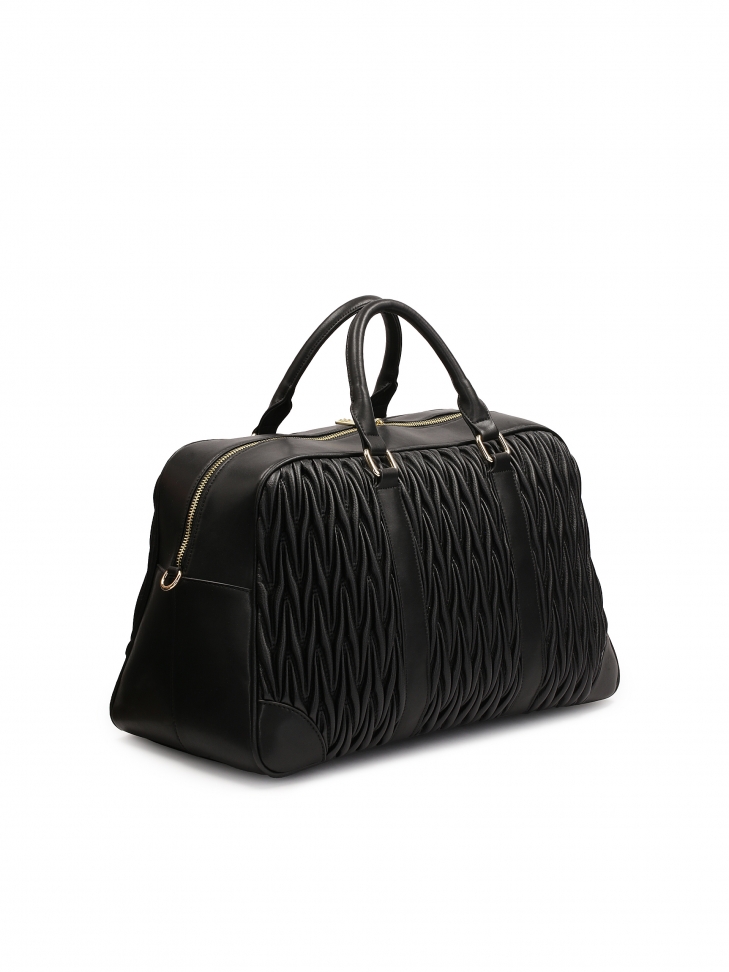 Bolsa de viaje de suave piel acolchada negra TRIP