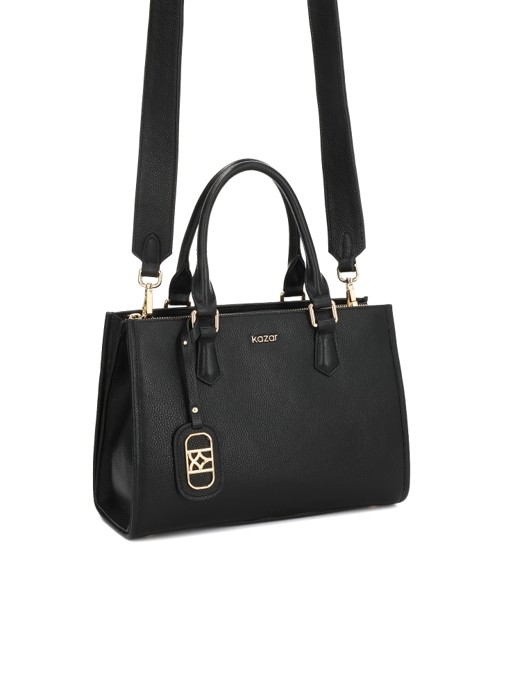 Bolso de piel negra con correa desmontable y compartimento con cerradura NAFI